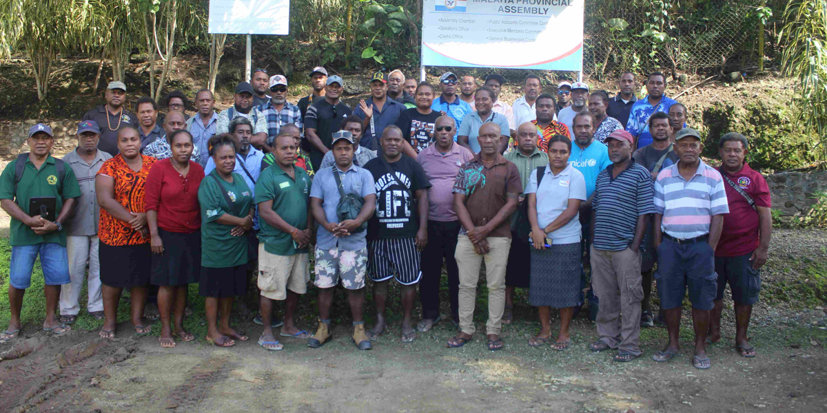 Participants pose in a group photo after the lauching of the NOD league table in Auki