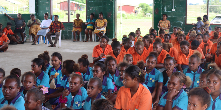 Students listening at the awareness