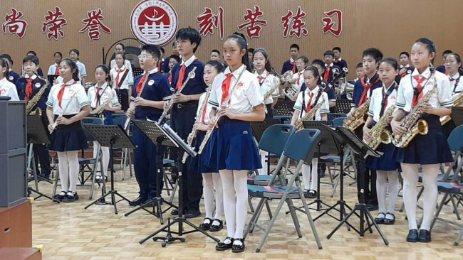 The brass band performing