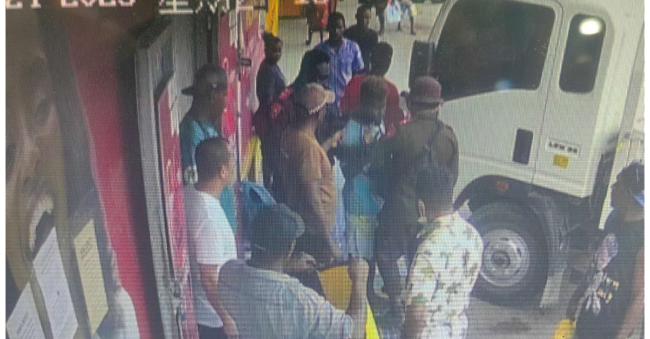 HCC officers outside the shop on Thursday