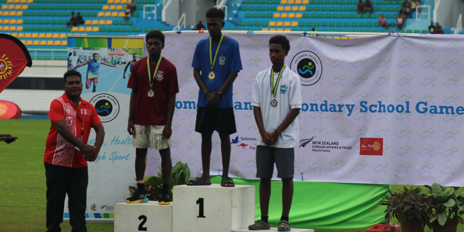 Jared receiving his gold medal