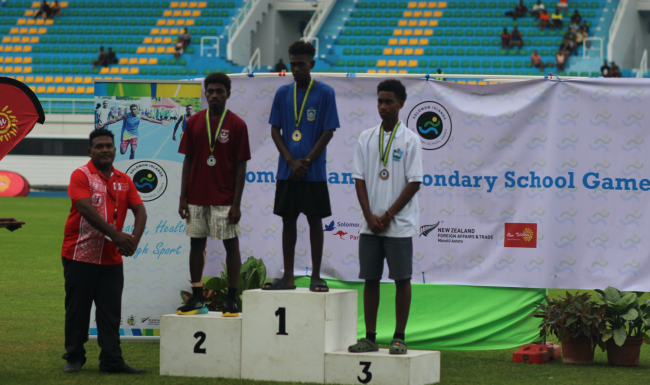 Jared receiving his gold medal