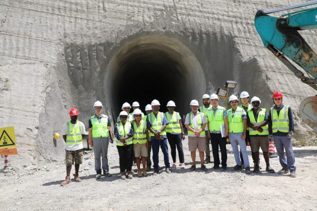 Hon Wale and the project team at the power house site