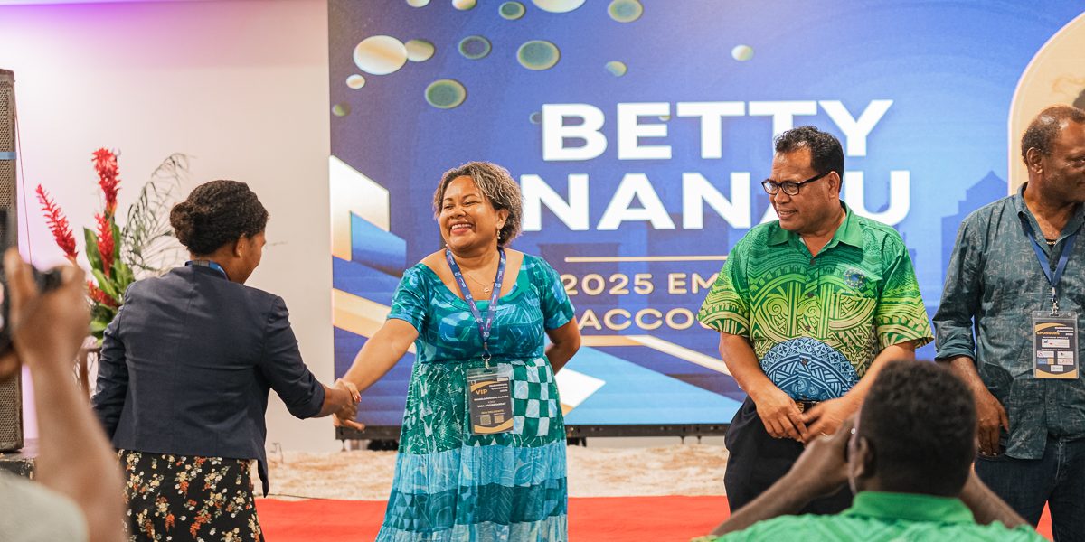 Pamela Naesol (middle) presending an award to a young and emerging accountant, Betty Nanau at the ISIA Gala Dinner and Award Presentation.