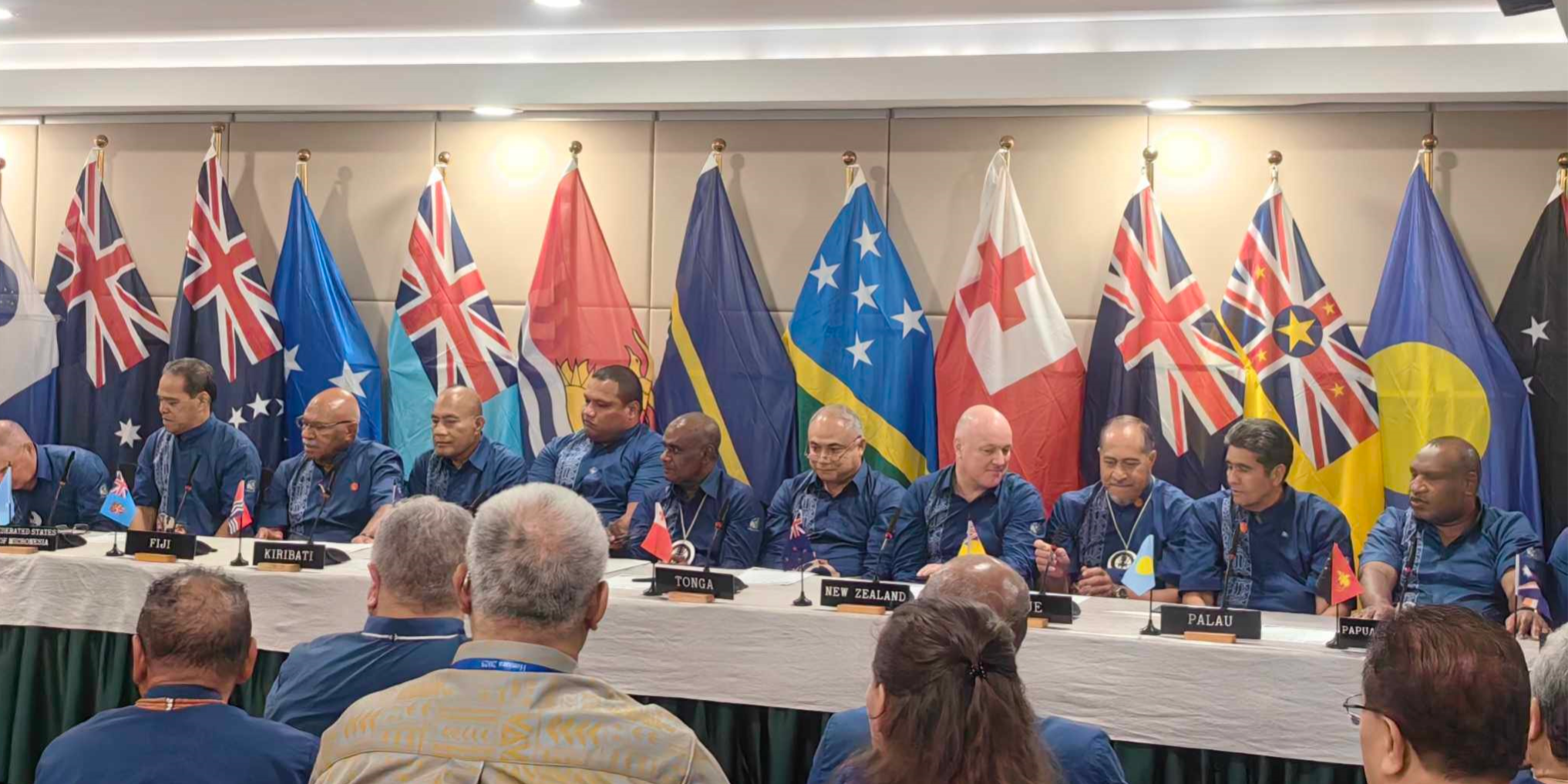 Fifteen of the 18 Pacific Islands leaders sign the Pacific Resilience Facility at Heritage Park Hotel last night.