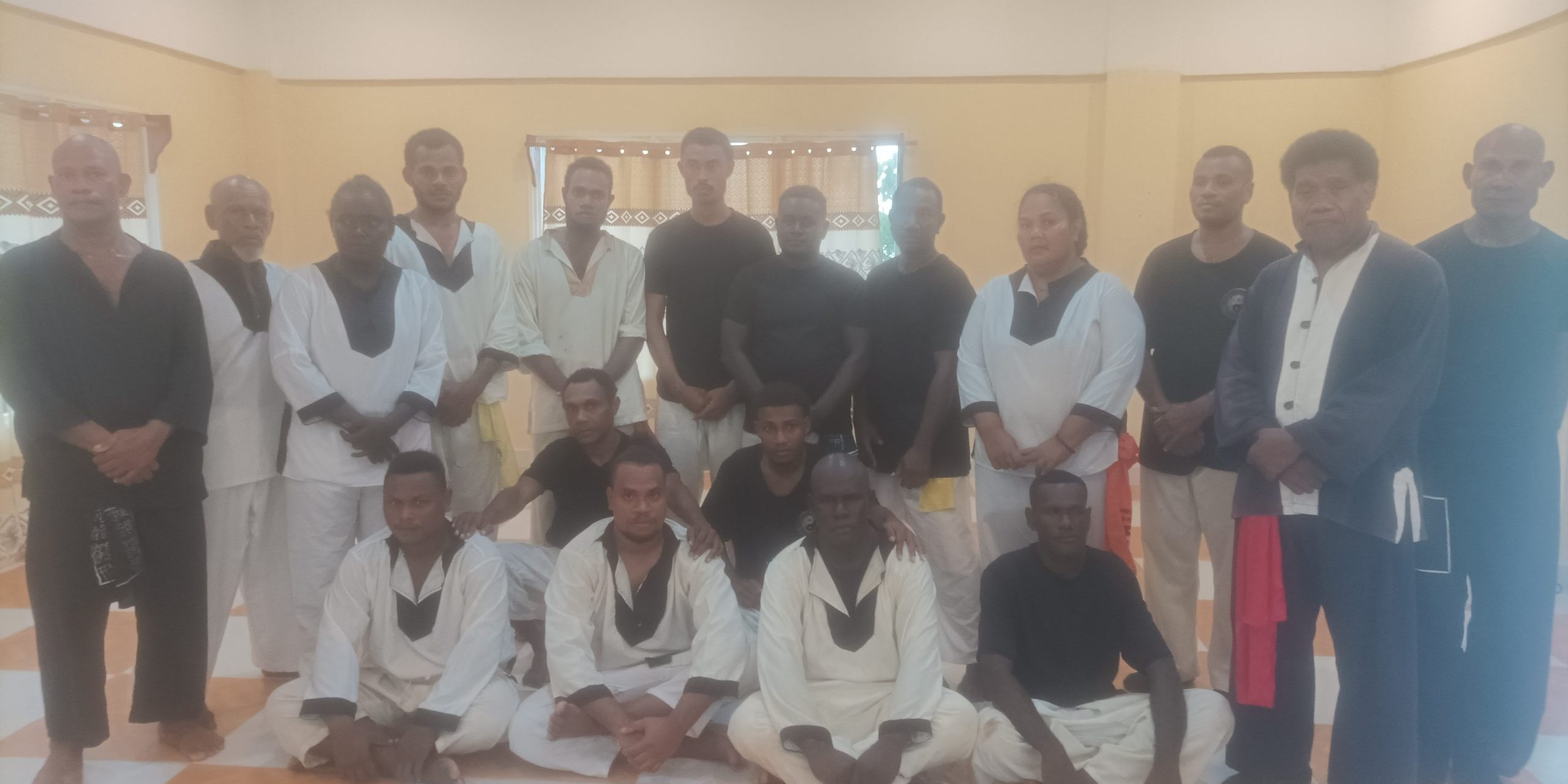 Noro Kungfu students with their leaders pose for a group photo during the grading session