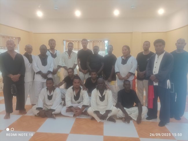 Noro Kungfu students with their leaders pose for a group photo during the grading session