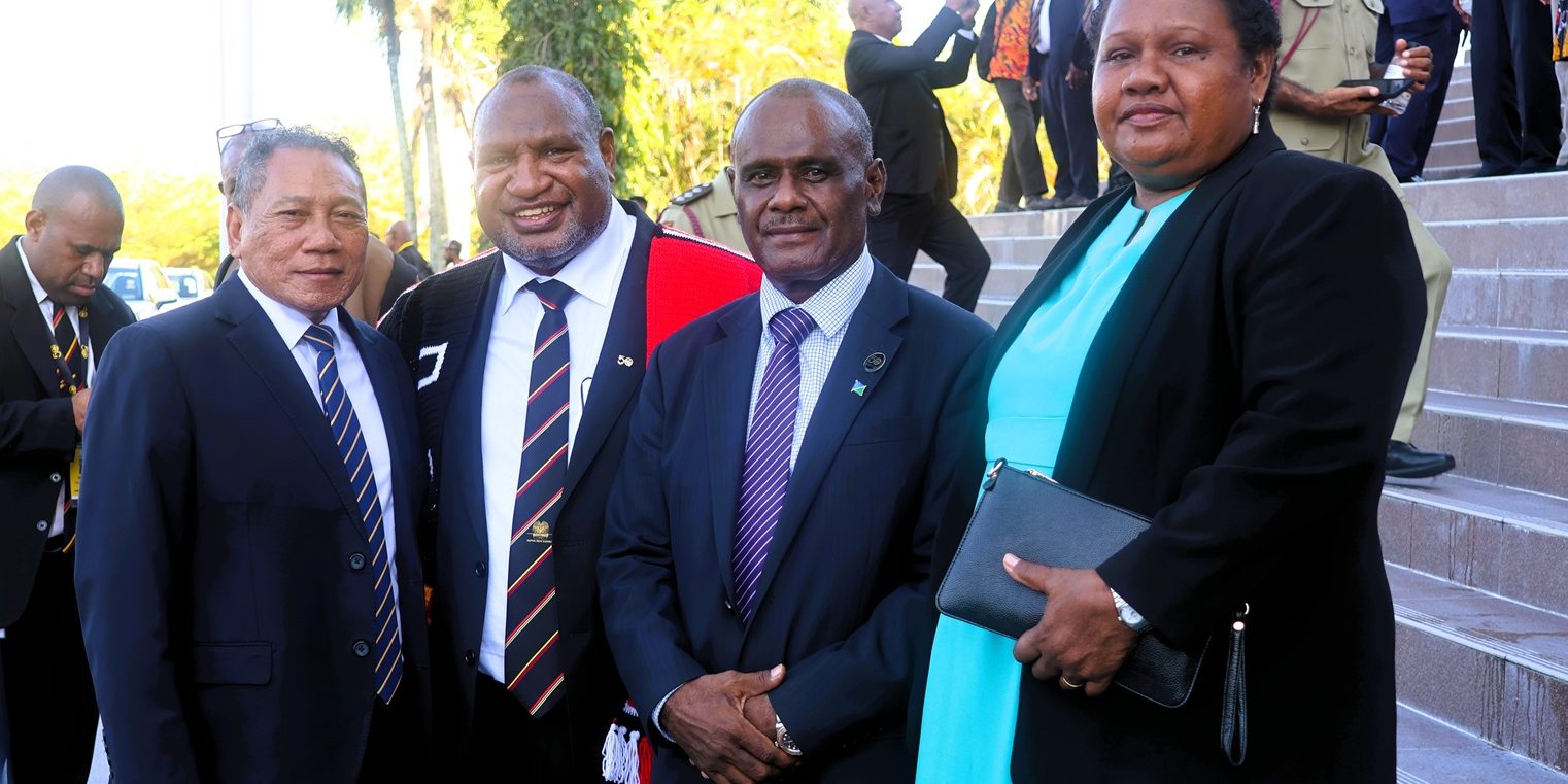 PM Manele and Foreign Affairs Minister, congratulating PNG Prime Minister