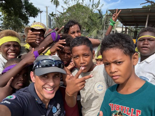 RAPPP Advisor Kevin Shaw and local children at PIF Rifle Range event