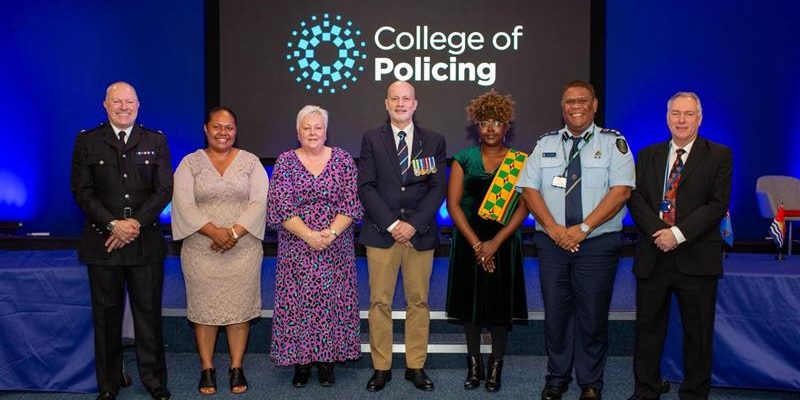 Group photo with members of the UK College of Policing