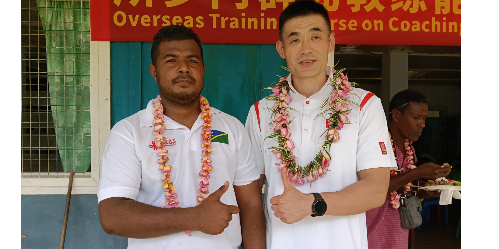 Jim Ben with China official