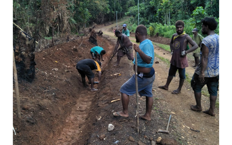 Youths lead effort to rehabilitate feeder road