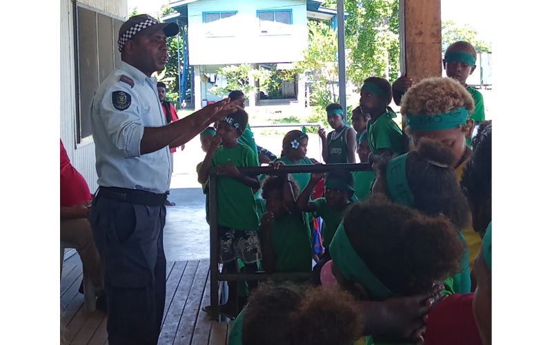 Tulagi police join children to mark big day