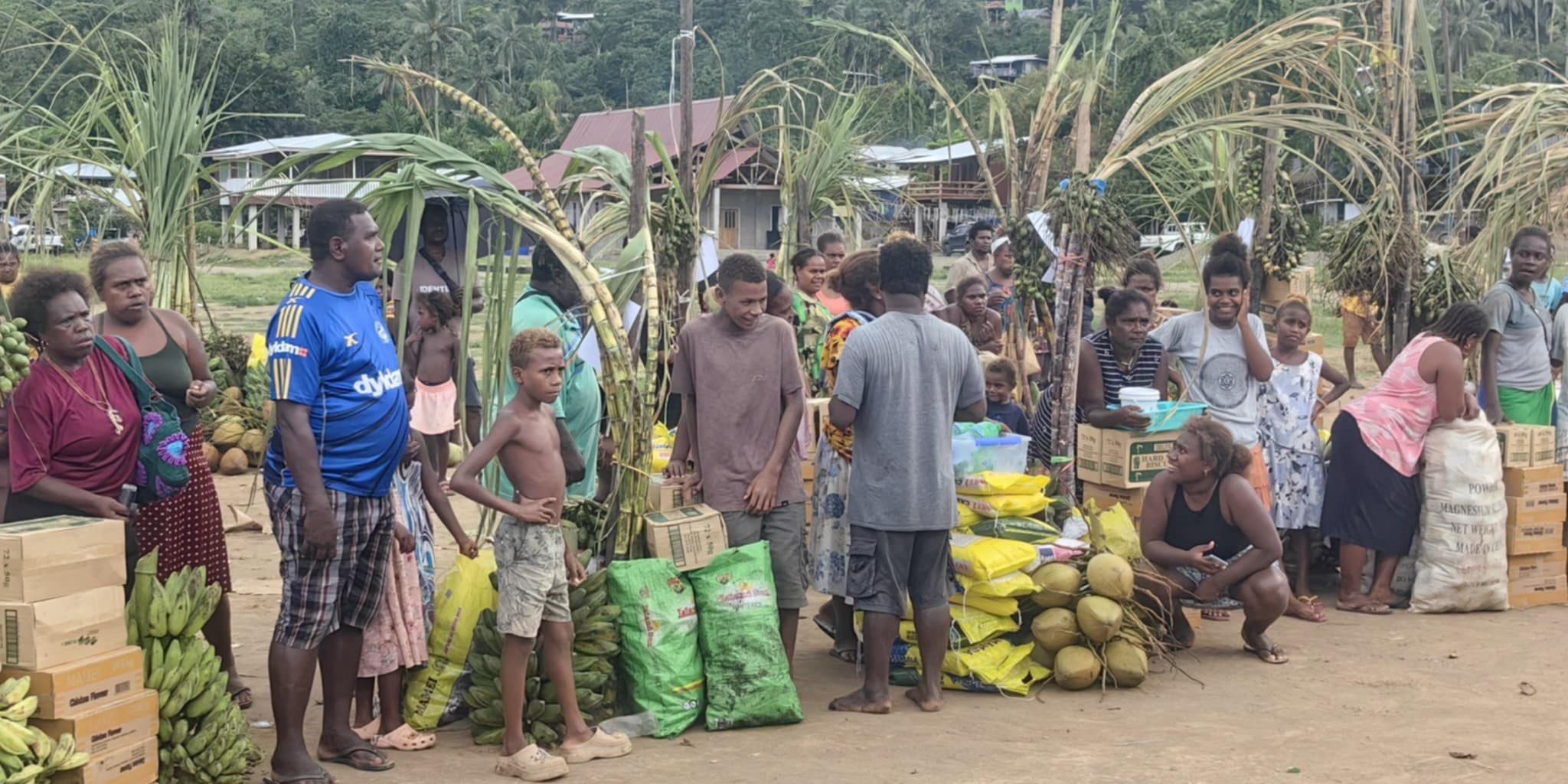 The community members of Turarana village in Central Guadalcanal with the chupu gifts.