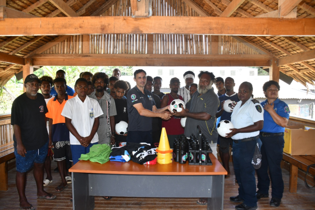 White River FC Team Manager George Taro (R) receiving the sports gear from AFP RAPPP Advisor Kevin Shaw