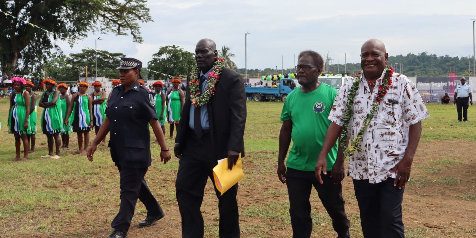 Premier Billy Veo escorted at the parade grounds