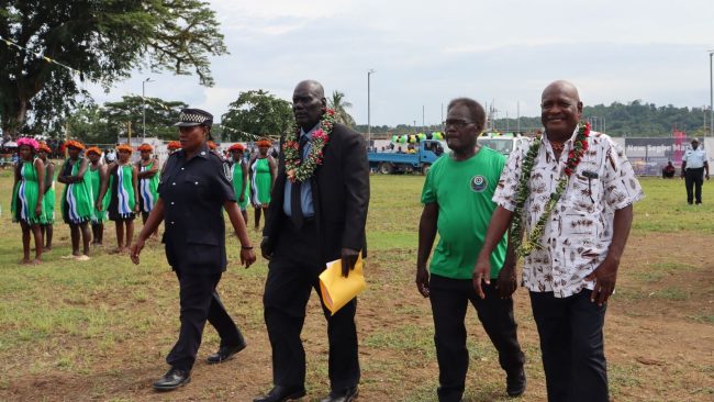 Premier Billy Veo escorted at the parade grounds