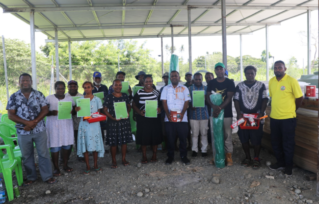 MP Dr. Paul Bosawai, with school recipient representatives