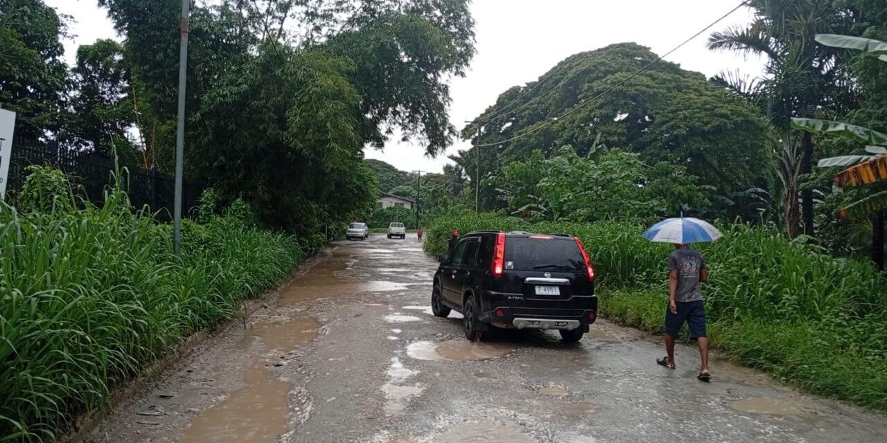 Part of the road which is dotted with potholes