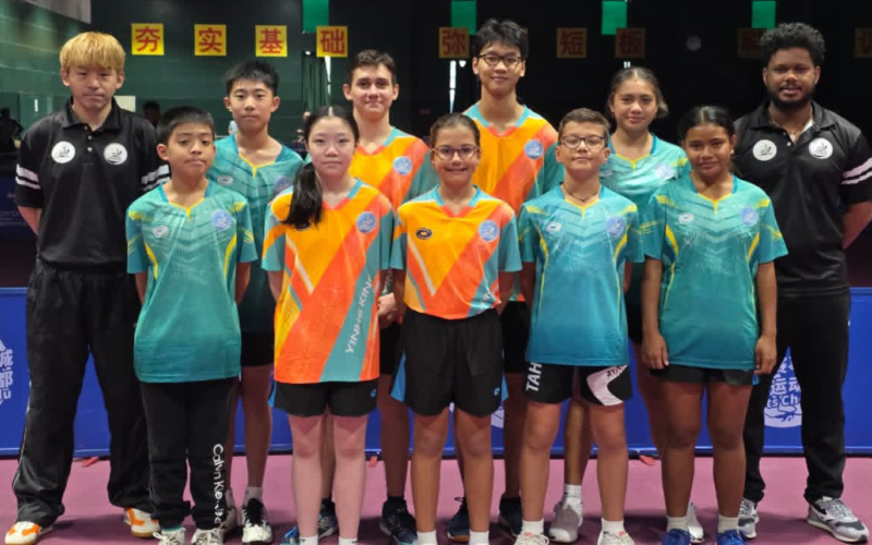 Tennis Lass Gains Big Experience