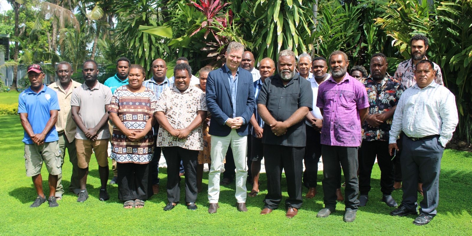 A group photo with Minister Makario and High Commissioner Turner after the signing