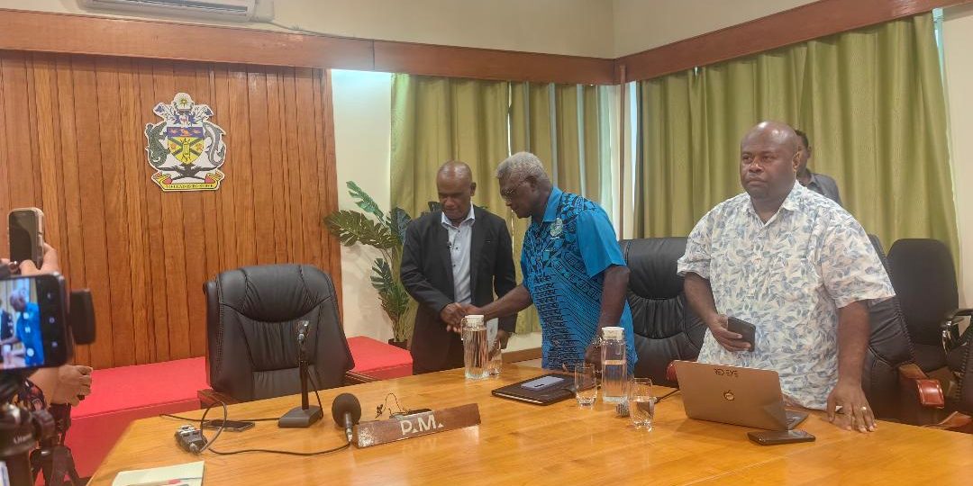 Prime Minister Jeremiah Manele meets with his Deputy Prime Minister, Manasseh Sogavare before the press conference yesterday.