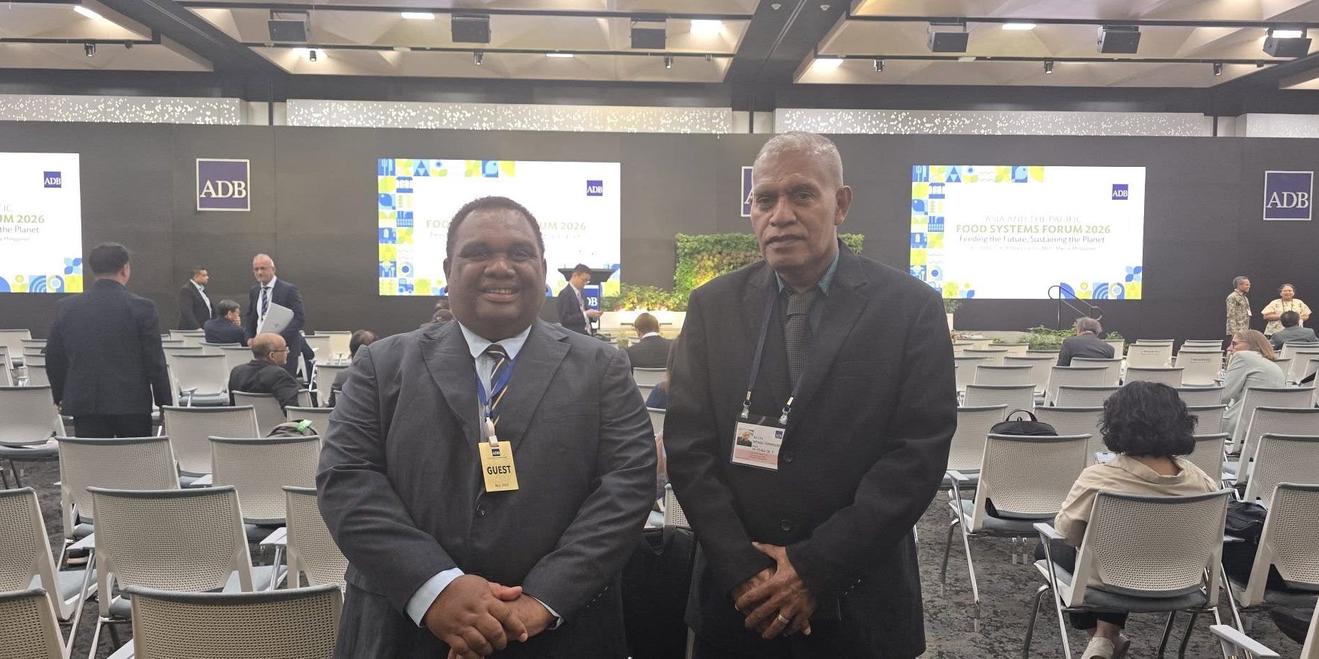 Resigned Minister for Agriculture and Livestock, Franklyn Wasi and Deputy Secretary, Michael Ho’ota in Manila, Philippines. (2)