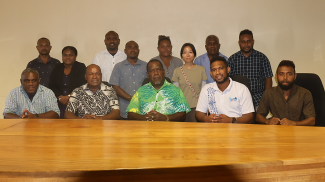 Group photo of HCC and SINU representatives.