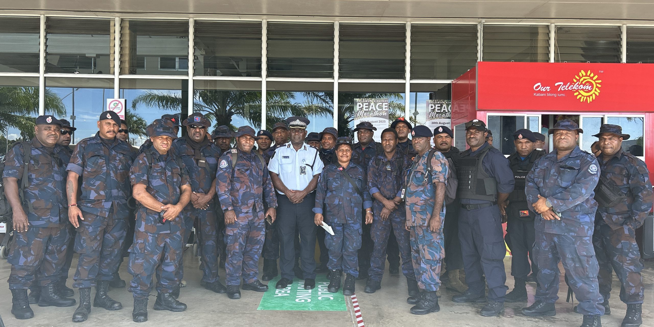 RPNG with the RSIPF Deputy Commissioner Operations Simpson Pogeava at the Henderson International Airport