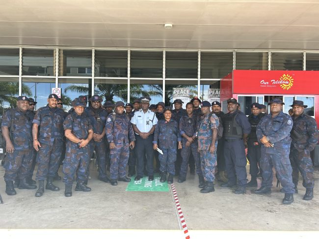 RPNG with the RSIPF Deputy Commissioner Operations Simpson Pogeava at the Henderson International Airport